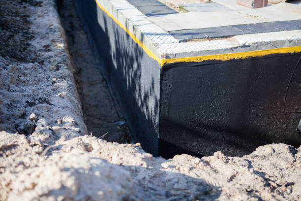 Professional Waterproofing technician working in Sparta, TN